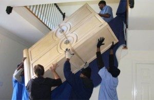 My Guys movers handling white dresser